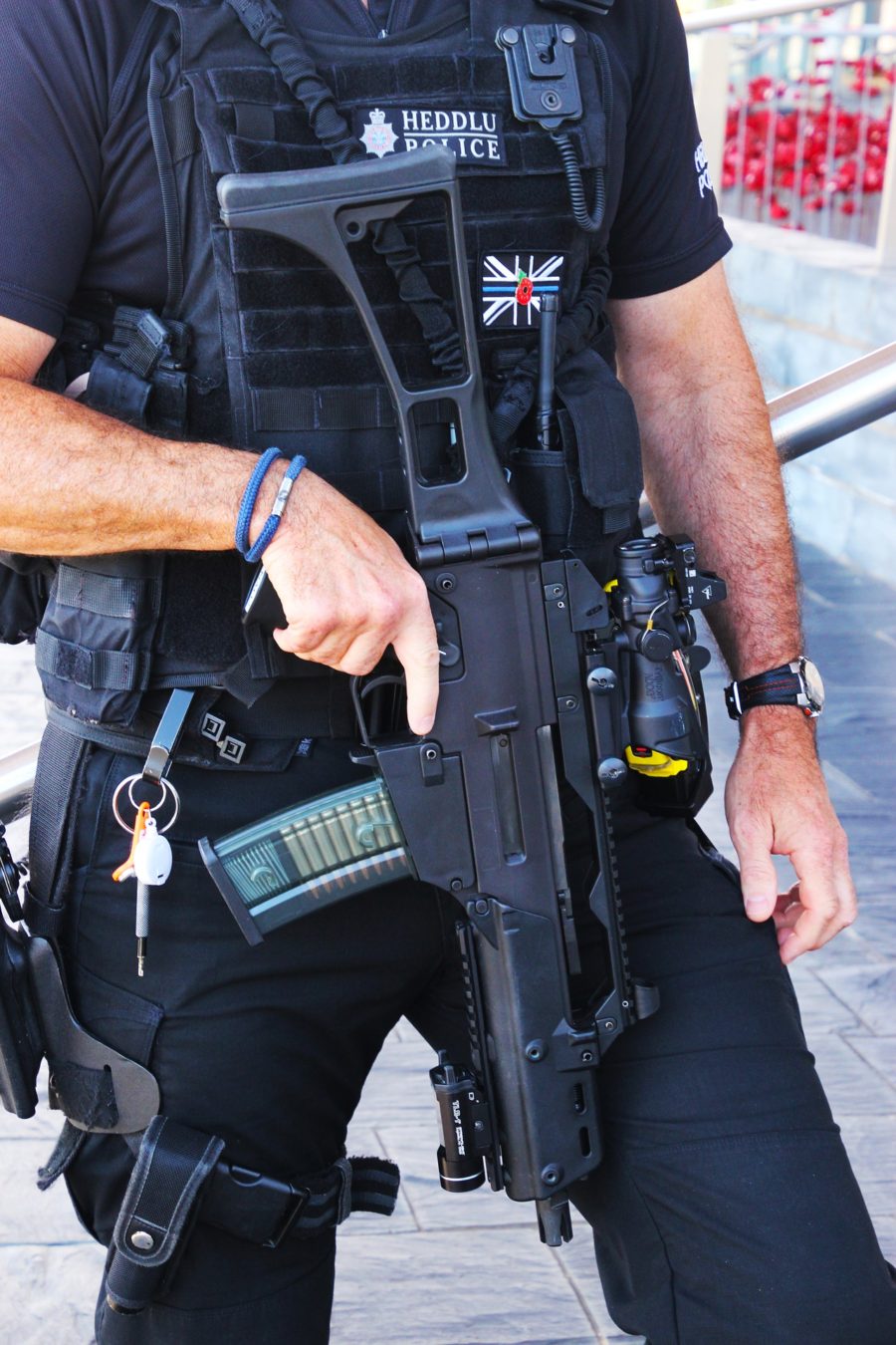 policeman totting rifle
