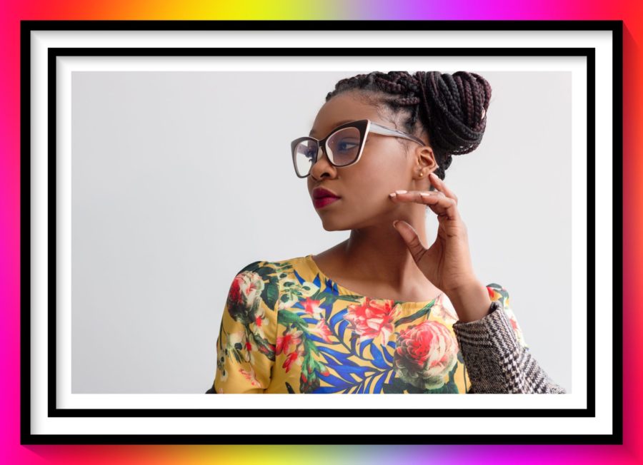 a beautiful black woman in glasses for Unbreakable Episode 19
